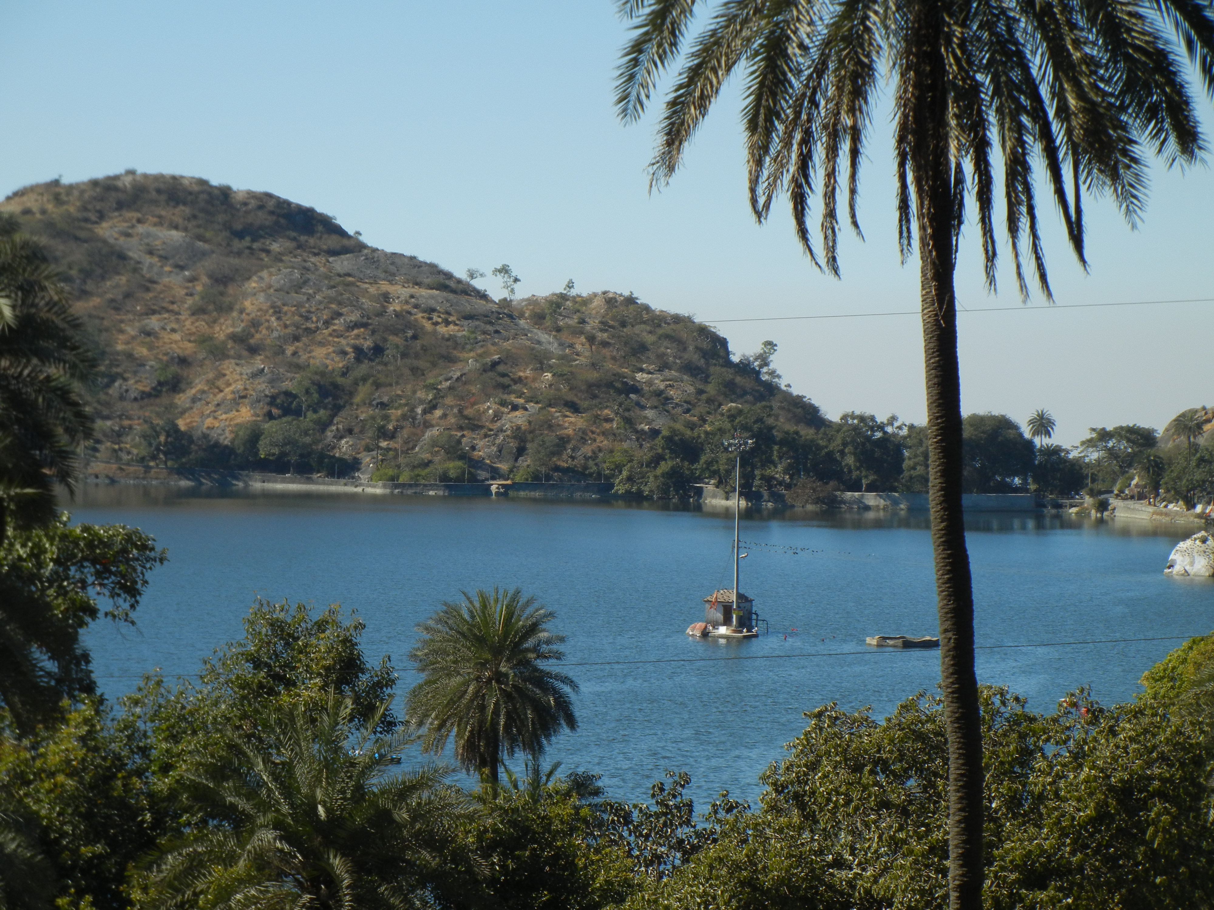 A calm lake in Rajasthan on a clear day