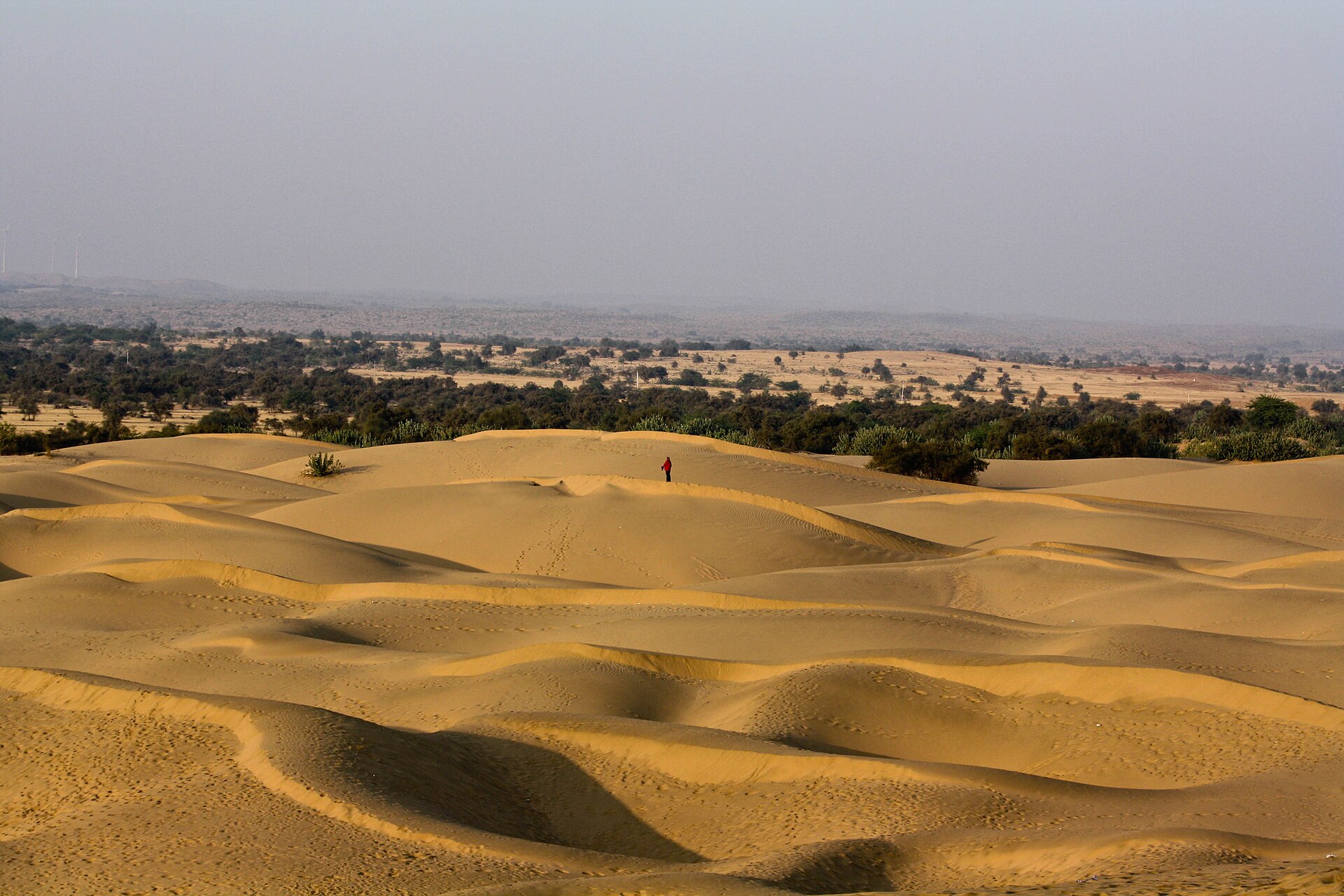 A luxury desert camp in the Thar with dining set under the stars